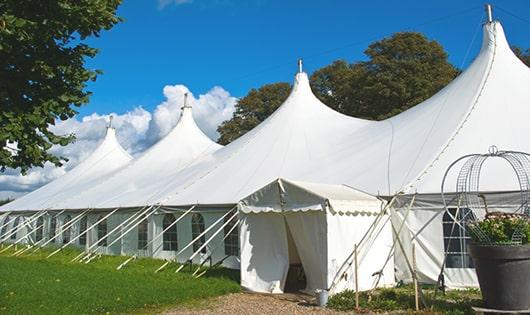 a line of sleek and modern portable toilets ready for use at an upscale corporate event in Mariposa